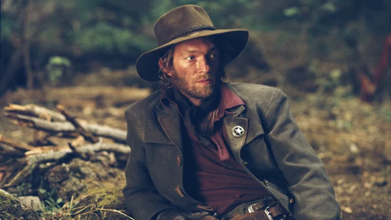 Delve into a doctorate-level analysis of Jan Kounen’s Blueberry (2004). Explore the film's integration of Moebius’s visual legacy, shamanic consciousness, and the subversion of traditional Western tropes.