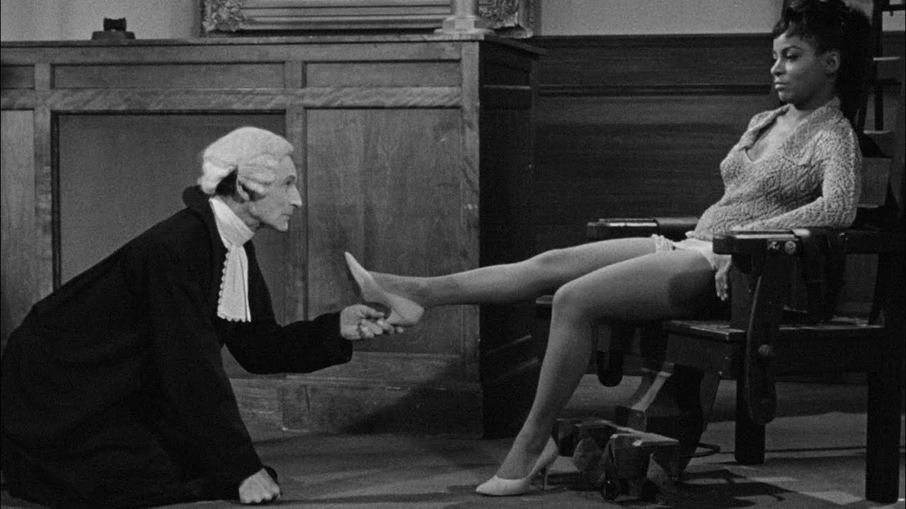 Mirrors, Masks, and Revolution: Why The Balcony Remains a Cinematic Oddity